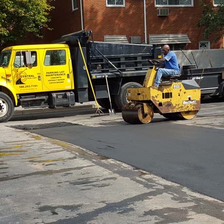 A parking lot that has been hot rubberized crack sealed